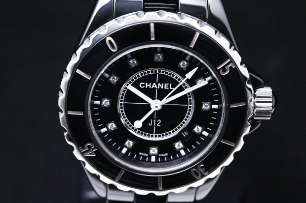 Sport watch style. Watch label: Swiss Made